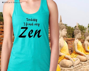 May include: A turquoise tank top with the text "Today I find my Zen" printed in black.