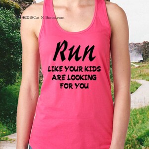 May include: Pink tank top with black text that reads "Run like your kids are looking for you".