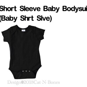 May include: A black short-sleeve baby bodysuit with a snap closure. The text "Short Sleeve Baby Bodysuit (Baby Shrt Sive)" and "Design&copy;2018Cat-N-Bones" are printed on the image.