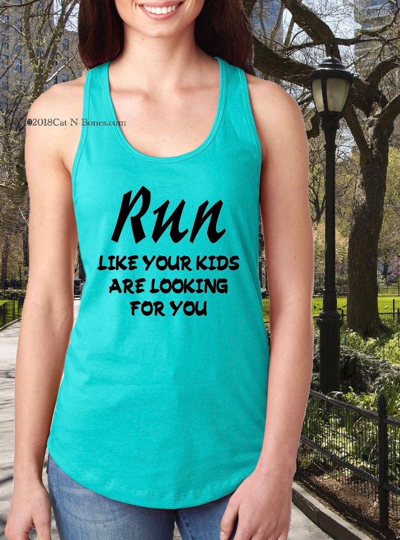 May include: A turquoise tank top with the text "Run like your kids are looking for you" printed in black.