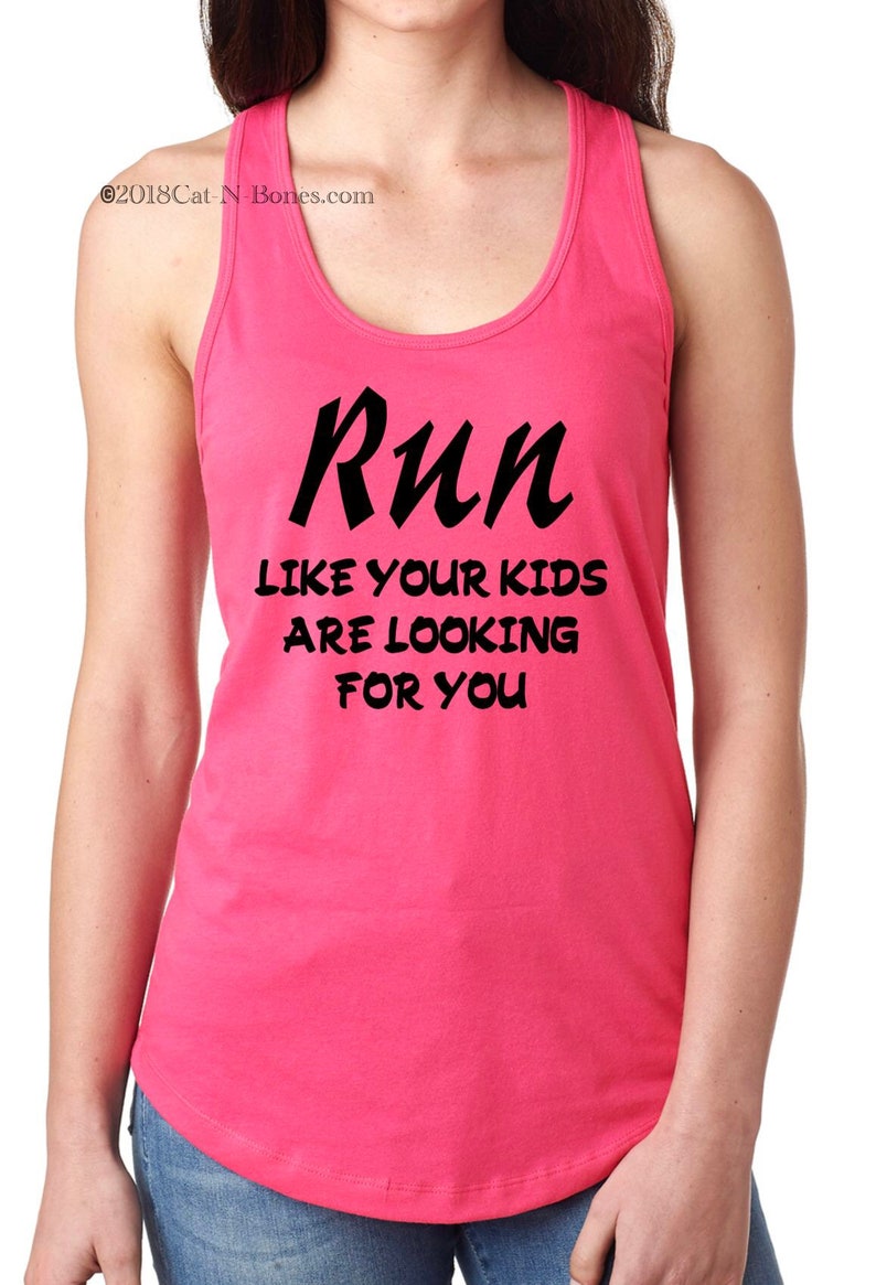May include: Pink tank top with a black graphic that says "Run like your kids are looking for you."