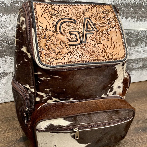 Bolso de piel con pelo repujado a medida