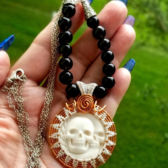Carved sale skull necklace