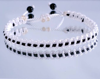 White with a black line bracelet -support wristband -braided -new -adjustable for man and woman