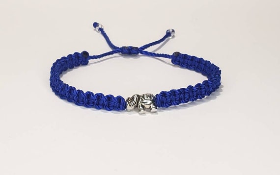 Blue thread hotsell bracelet