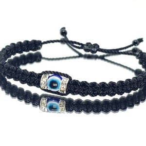 Evil eye amulet, evil eye braided bracelet, black string wristband with an evil eye for protection, adjustable