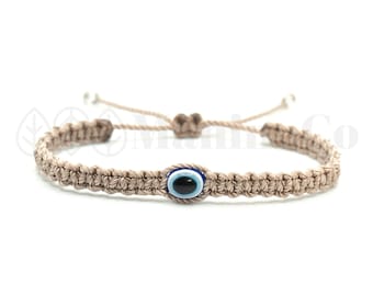 evil eye braided bracelet, beige string wristband with an evil eye for good luck and protection, adjustable for man and woman