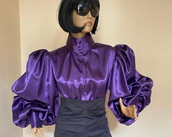 Deep purple satin blouse with high collar and puffy sleeves