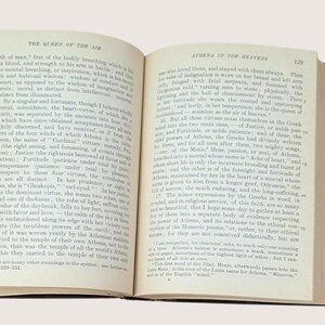 May include: Open book with text on aged paper. The pages display text about Athena and the Queen of the Air. The text is in English and is from an older publication.