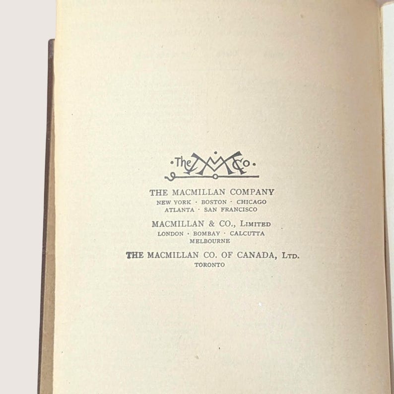 May include: Cream-colored book page featuring the logo of "The Macmillan Co." and the company's locations: New York, Boston, Chicago, Atlanta, and San Francisco. Also lists Macmillan & Co., Limited, with locations in London, Bombay, Calcutta, and Melbourne.