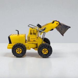 Vintage Yellow Tonka Turbo Diesel Front End Loader Toy: Classic Construction Vehicle