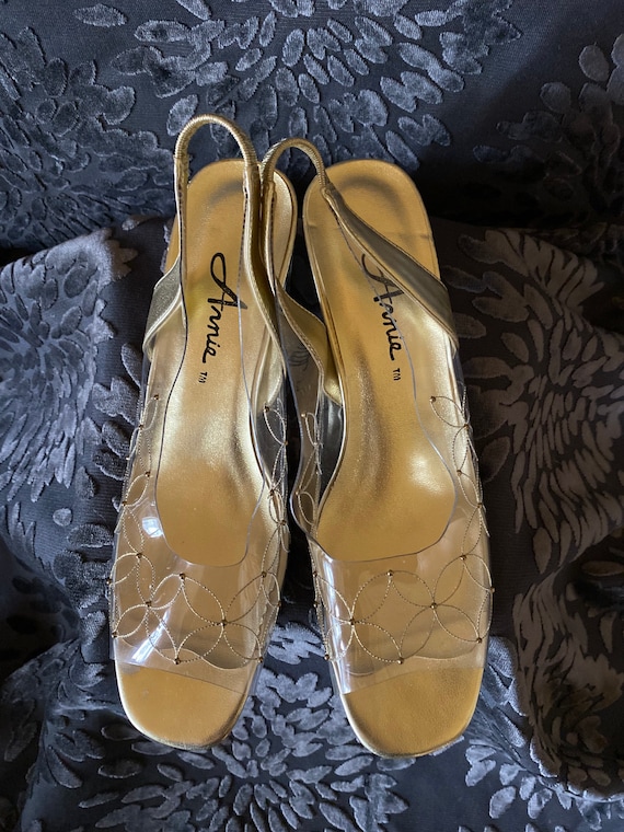 1960s clear plastic and gold sling back pumps