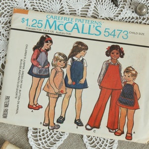 Vintage McCall de meisjes jumper & schort jurk patroon/meisjes top, blouse patroon/retro 70 's broek en korte broek patroon 5473/maat 6 schort