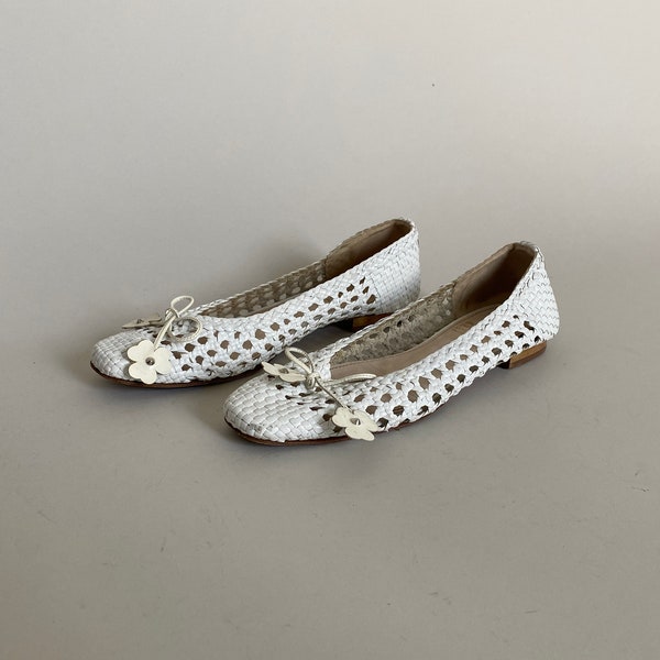 white leather flatforms