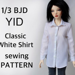 May include: A white classic shirt sewing pattern for a 1/3 BJD YID doll. The shirt has long sleeves, a collar, and buttons down the front. The text "1/3 BJD YID Classic White Shirt sewing PATTERN" is displayed on the left.