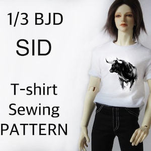 May include: White t-shirt with a black and white bull graphic, worn by a doll. The text on the left side of the image reads "1/3 BJD SID T-shirt Sewing PATTERN."