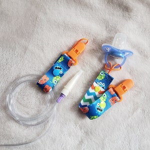 Various Prints - 2IN1 Tubie/Pacifier Clip (Gtube, gj tube, feeding tube organizer, catheter wrap, tubing extension, diaper bag accessory)