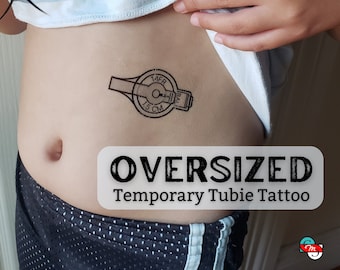 May include: A black and white temporary tattoo of a medical device with the text "14FR 1.5 CM" and "BAL". The tattoo is on a person's stomach and the text "OVERSIZED Temporary Tubie Tattoo" is below the tattoo.