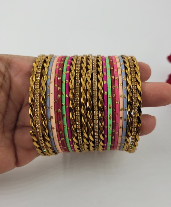 Touchstone Colorful 2 Dozen Bangle Collection Indian Bollywood Alloy Metal Textured Designer Jewelry Special Large Size Bangle Bracelets Set of 24 in Antique Gold Tone Women