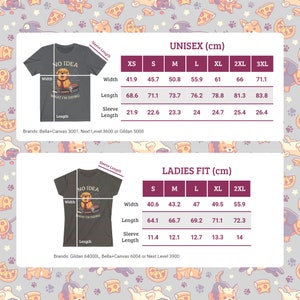 Op de afbeelding: Twee donkergrijze t-shirts met maattabellen. E&eacute;n is unisex, de andere is voor dames. Beide hebben een hondenafbeelding en de tekst "NO IDEA WHAT I'M DOING". De unisex maten zijn in cm.