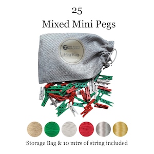 May include: A set of 25 mixed mini pegs in red, green, and white, stored in a grey fabric bag labelled The Rustic Merchant Peg Bag. The set includes a storage bag and 10 metres of string, with six colour-coded thread spools shown below the pegs.