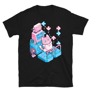May include: Black t-shirt with a pink and blue illustration of a cat playing a retro arcade game. The game is called "Dance-Ball!" and the cat is wearing a pink headband. The illustration is surrounded by blue and pink arrows.