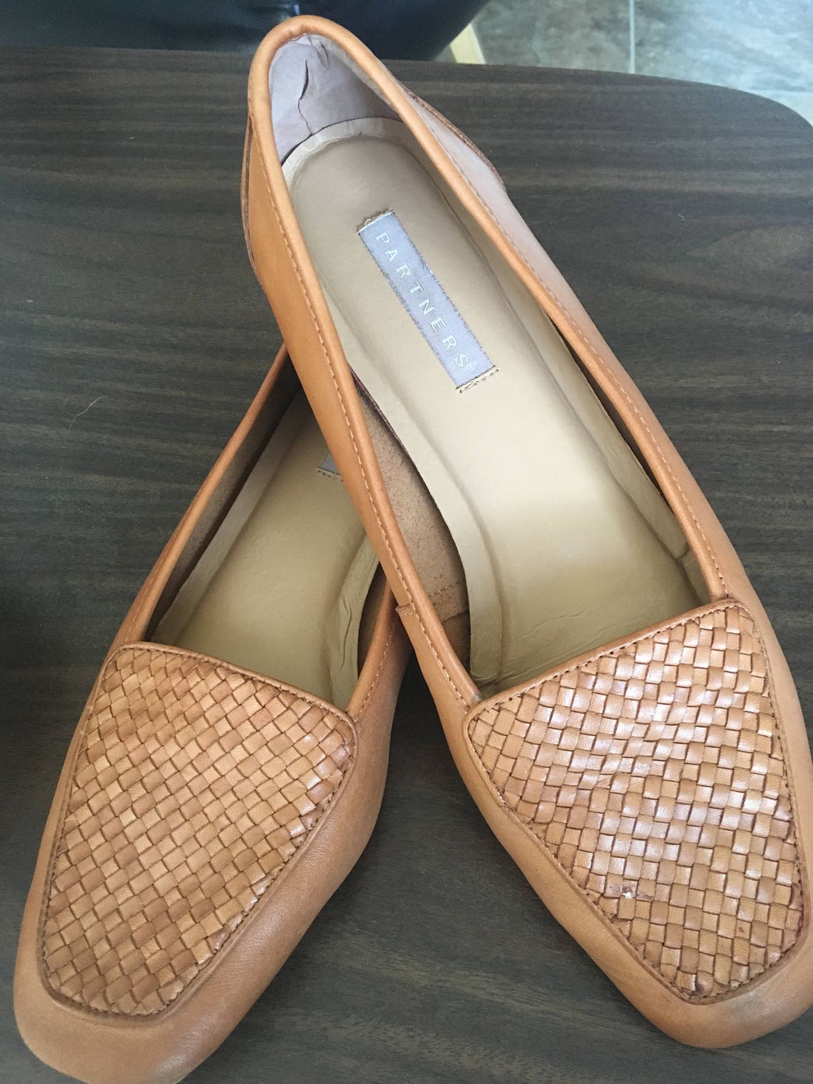 shiny tan flats