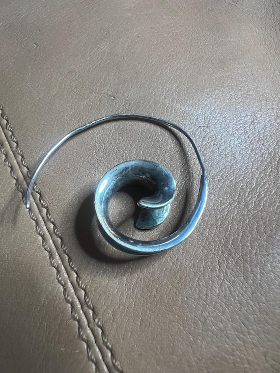 Sterling silver earring, one earring.