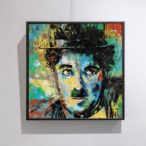 May include: A colourful abstract painting of a man's face wearing a black hat. The painting is done in a variety of colours, including blue, green, yellow, and red. The man's face is painted in a realistic style, with a moustache and a serious expression.