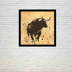 May include: A black and white illustration of a bull with horns, set against a yellow background with splashes of red, blue, and black paint.