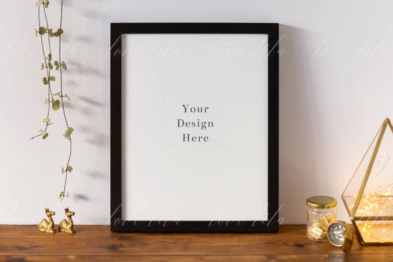Modern Frame Mockup Portrait Frame On Wooden Table