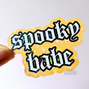 Spooky babe vinyl sticker- orange. Holographic Halloween sticker.