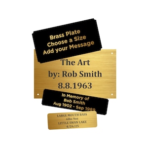 May include: A collection of brass and black plates with text. The largest plate reads "The Art by: Rob Smith 8.8.1963." Other plates include "Brass Plate Choose a Size Add your Message" and "In Memory of Bob Smith Aug 1902 - Sep 1989."