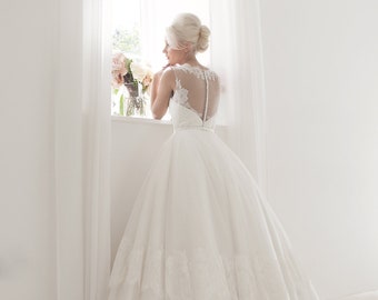 House of Mooshki original Augusta Sleeveless ivory lace and tulle ballgown with applique lace to hem of the skirt