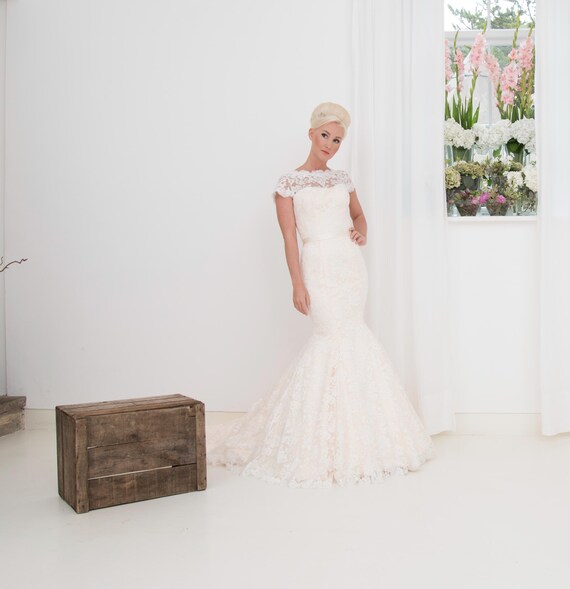 Sarah fishtail in stunning apricot mikado with a ivory lace overlay and a lace cap sleeve Sarah fishtail in stunning apricot mikado with a ivory lace overlay and a lace cap sleeve