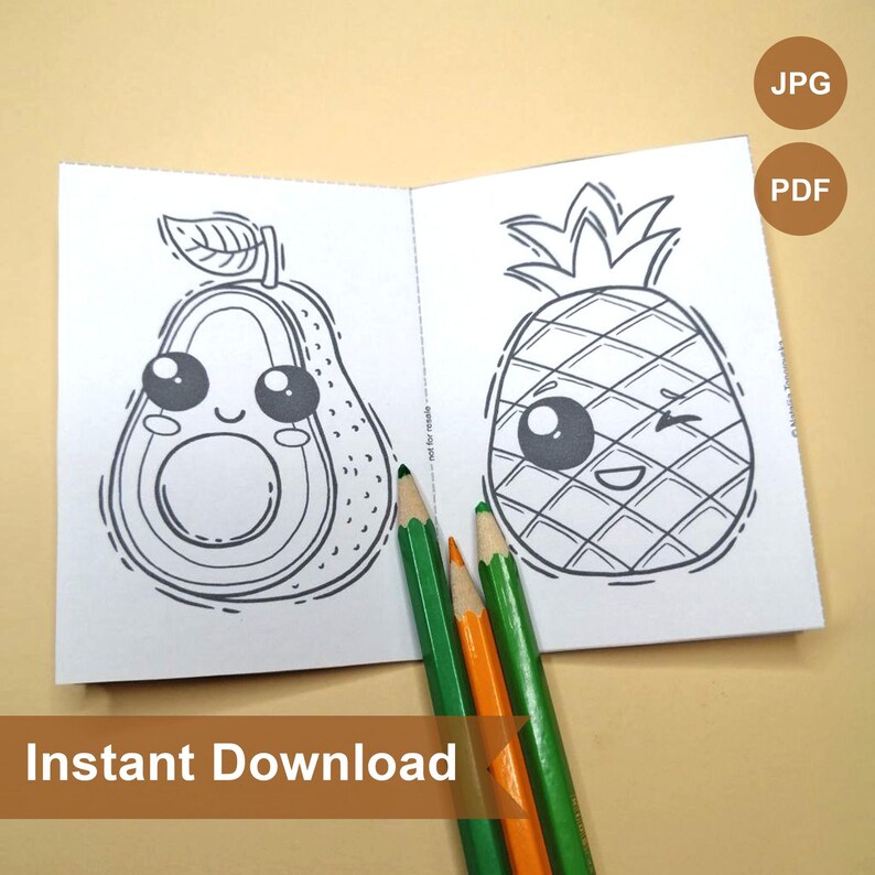 May include: A black and white coloring book with a cute avocado and pineapple on the cover. The book is open to reveal two pages with illustrations of a smiling avocado and a winking pineapple. The text "Instant Download" is printed below the book.