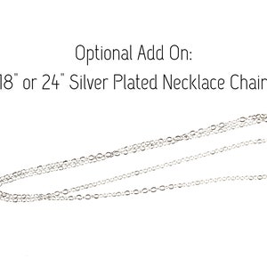 May include: Silver plated necklace chain, available in 18" or 24" lengths.