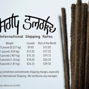 May include: A close-up of several brown incense sticks with the text "Holy Smoke" in a stylized font. The image also includes a table detailing international shipping rates based on weight, ranging from 1/2 pound to 4 pounds.