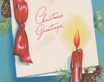 Pre-owned 1940s Christmas card -- pretty turquoise blue color with pine cones and red candle