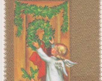 1950s unused Brownie Christmas card by Rust Craft -- angels hanging Christmas wreath on door