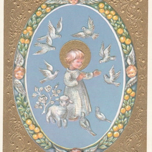 May include: Vintage religious card featuring a child with a halo, surrounded by doves and a lamb, set against a light blue background. The oval image is framed with a gold embossed border with floral and cherub accents.