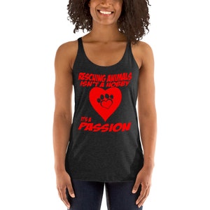 May include: A black tank top with a red graphic that says "Rescuing animals isn't a hobby it's a passion" with a red heart and paw print inside the heart.