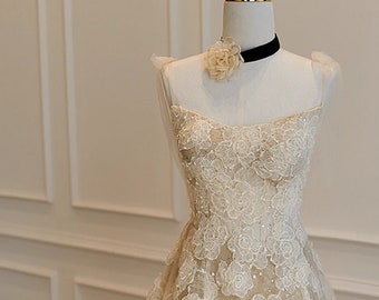 Marianne - floral lace A-line wedding dress.