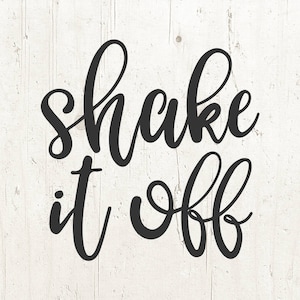 May include: Black and white calligraphy text on a white wood background. The text reads "Shake it off."