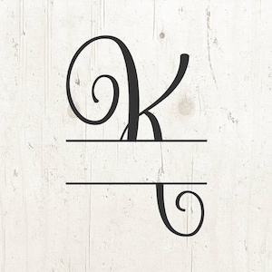 May include: A black and white monogram with the letter K in a decorative script font. The letter is split in half by a horizontal line, creating a space for a name or other text.