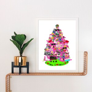 May include: A framed print featuring a vibrant, stylized Christmas tree composed of 1980s-themed items. The tree is primarily pink with green accents and includes boomboxes, roller skates, and sunglasses. The phrase "I ❤️ 80's" is at the base.