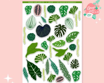 May include: A sheet of stickers featuring various green and blue leaves, with white outlines. The stickers are arranged in a random pattern. The text "AMAYA JADE AND CO. • LEAVES • NOT WEATHER OR WATERPROOF" is at the top of the sheet.