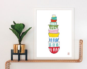 Puede incluir: Una pila de cuencos de mezcla vintage de colores con patrones florales y geométricos. Los cuencos están apilados en forma de torre, con el cuenco más grande en la parte inferior y el más pequeño en la parte superior. Los cuencos son de diferentes colores, incluyendo rojo, verde, azul, amarillo y rosa.