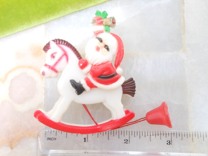 Vintage Christmas Santa Rocking Horse Brooch Pin Mechanical Plastic Kitsch Kitschmas Jewelry Gift HONG KONG Mid Century