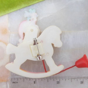 Vintage Christmas Santa Rocking Horse Brooch Pin Mechanical Plastic Kitsch Kitschmas Jewelry Gift HONG KONG Mid Century